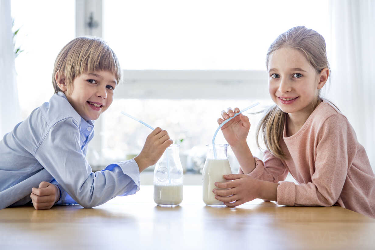 Brother And Sister Drinking Milk Pictures, Images and Stock Photos