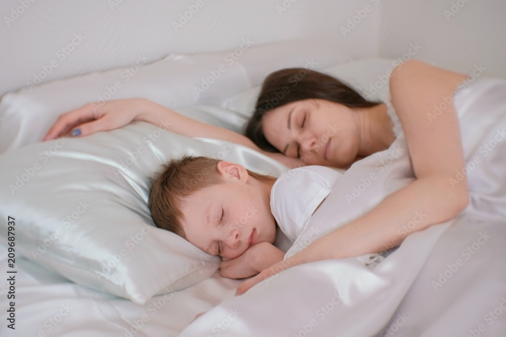 My nine-year-old son still wants to sleep in my bed. Should I let him?