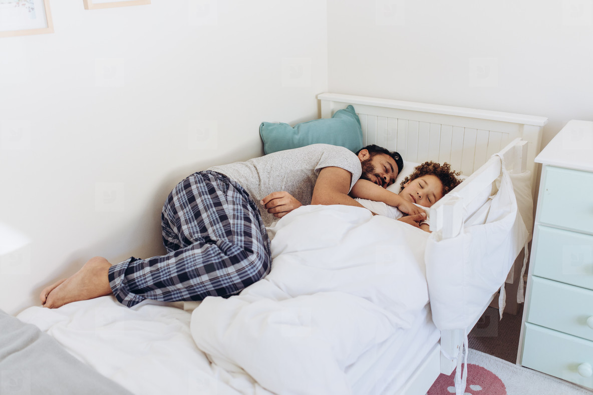 Dad share bed with son