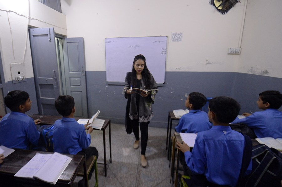 Pakistani teachr and student