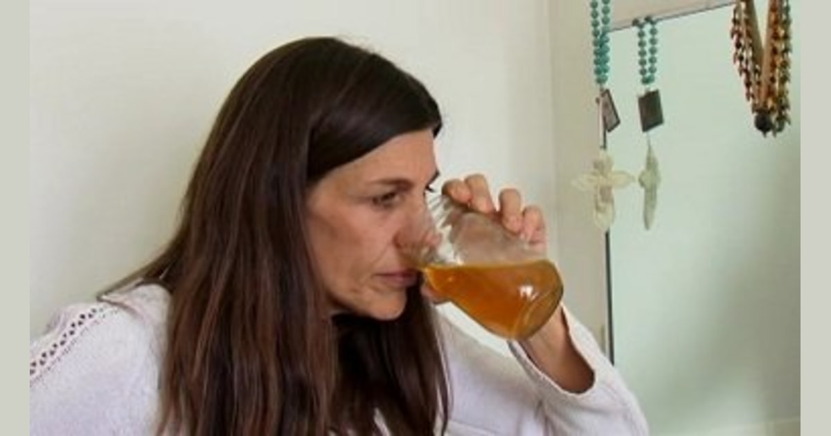 A girl drinking own urine