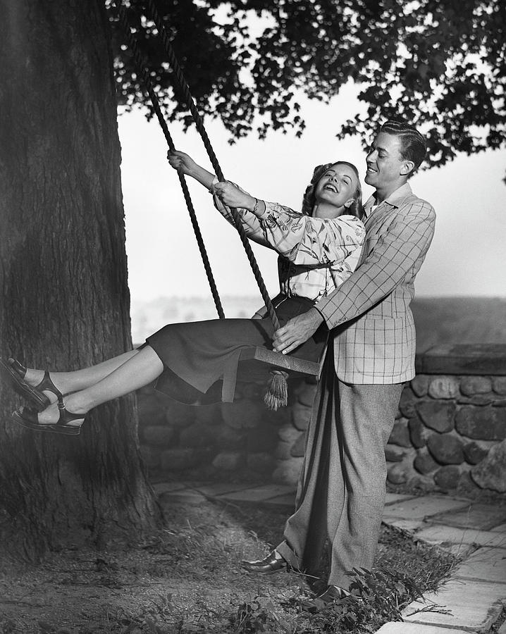 Search Results for Couple sitting on swing Black & White Stock Photos and Images (15)