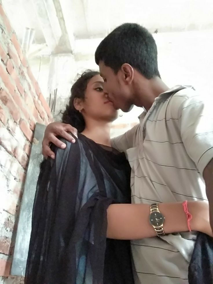 Indian teenage girl kissing her happy father