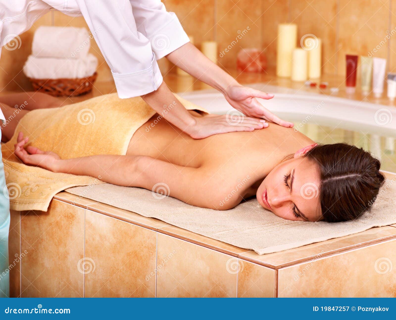 Mother and daughter having a massage in the bedroom. The concept of relaxation and health.